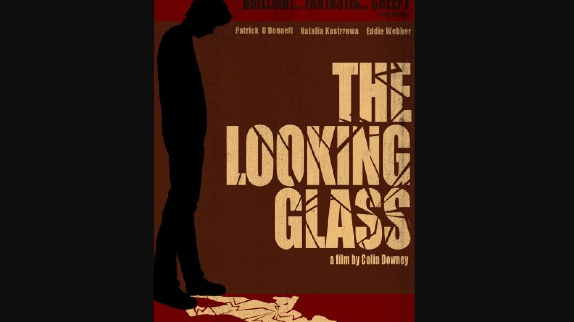 THE LOOKING GLASS